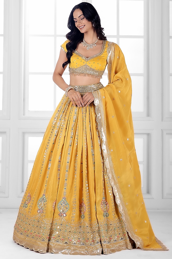 Yellow Tissue Silk Cutdana Embellished Wedding Lehenga Set by AJAY & PRIYANKA at Pernia's Pop Up Shop