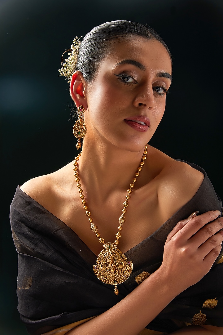 Gold Finish Kundan Polki & Multi-Colored Stone Temple Necklace Set by 20AM at Pernia's Pop Up Shop
