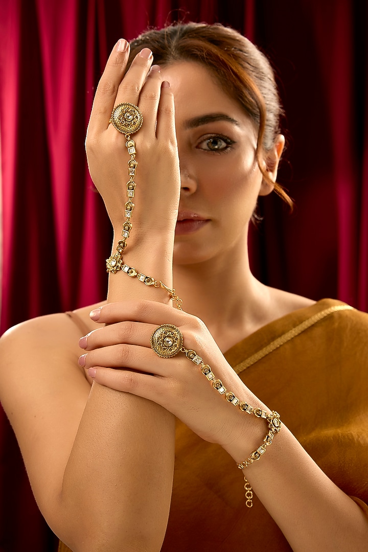 Gold Finish White Stone Floral Haathphools (Set Of 2) by 20AM at Pernia's Pop Up Shop