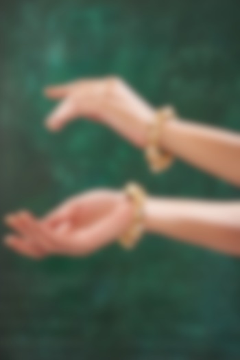 Gold Finish Stone Enamelled Bangles (Set Of 2) by 20AM at Pernia's Pop Up Shop