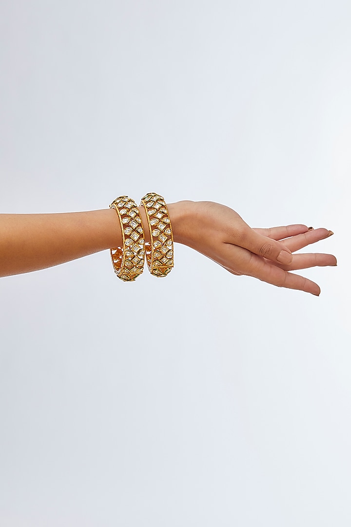 Gold Finish Kundan Polki Enameled Bangles (Set Of 2) by 20AM at Pernia's Pop Up Shop