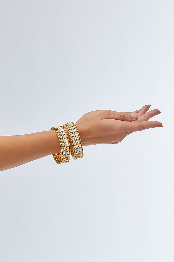 Gold Finish Kundan Polki & Pearl Bangles (Set Of 2) by 20AM at Pernia's Pop Up Shop