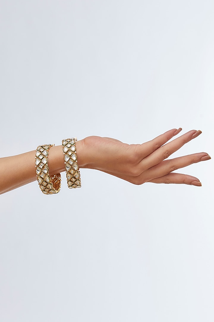 Gold Finish White Kundan Polki Meenakari Bangles (Set Of 2) by 20AM at Pernia's Pop Up Shop