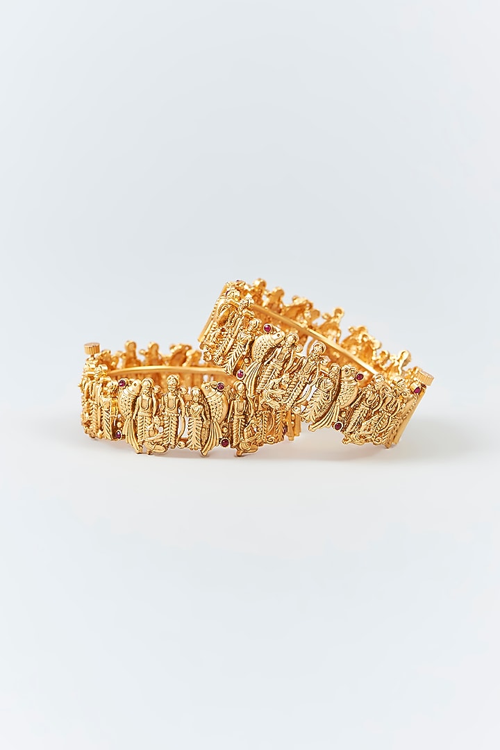 Gold Finish Ruby & Motif Bangles (Set Of 2) by 20AM at Pernia's Pop Up Shop