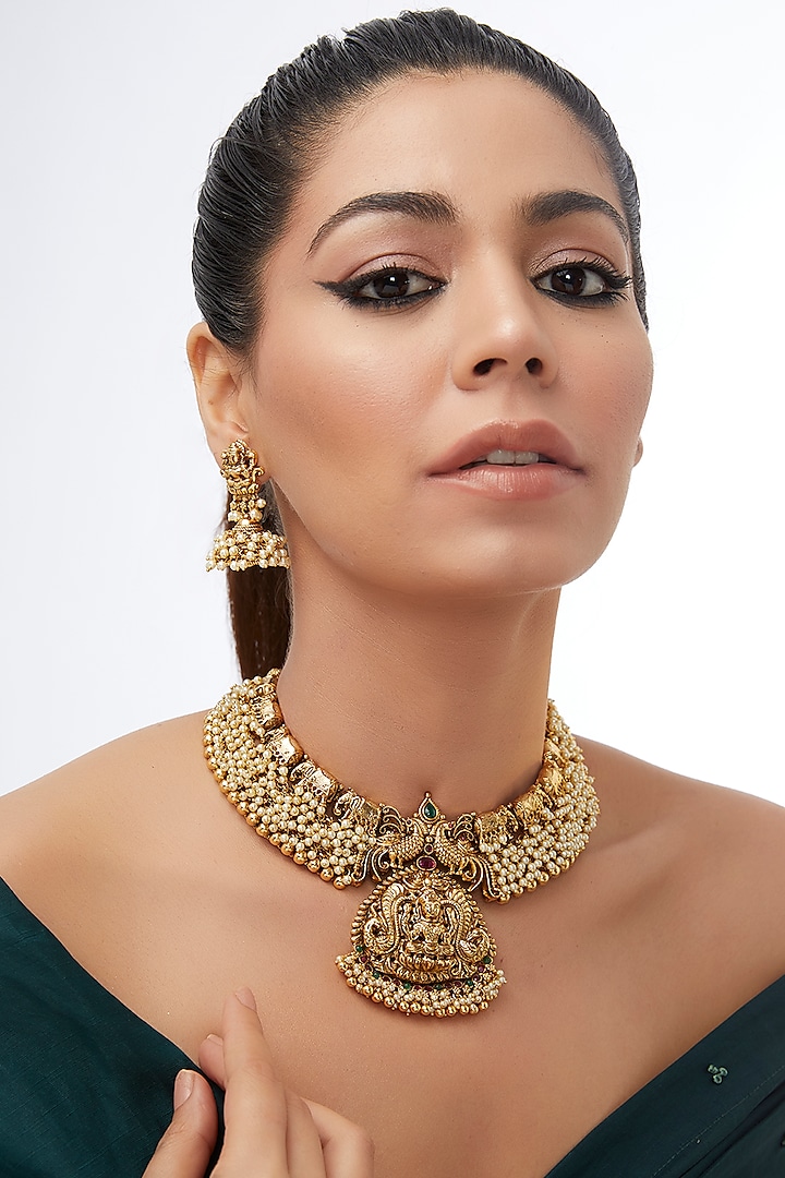 Gold Finish Laxmi Ji Motif & Pearl Temple Necklace Set by 20AM at Pernia's Pop Up Shop