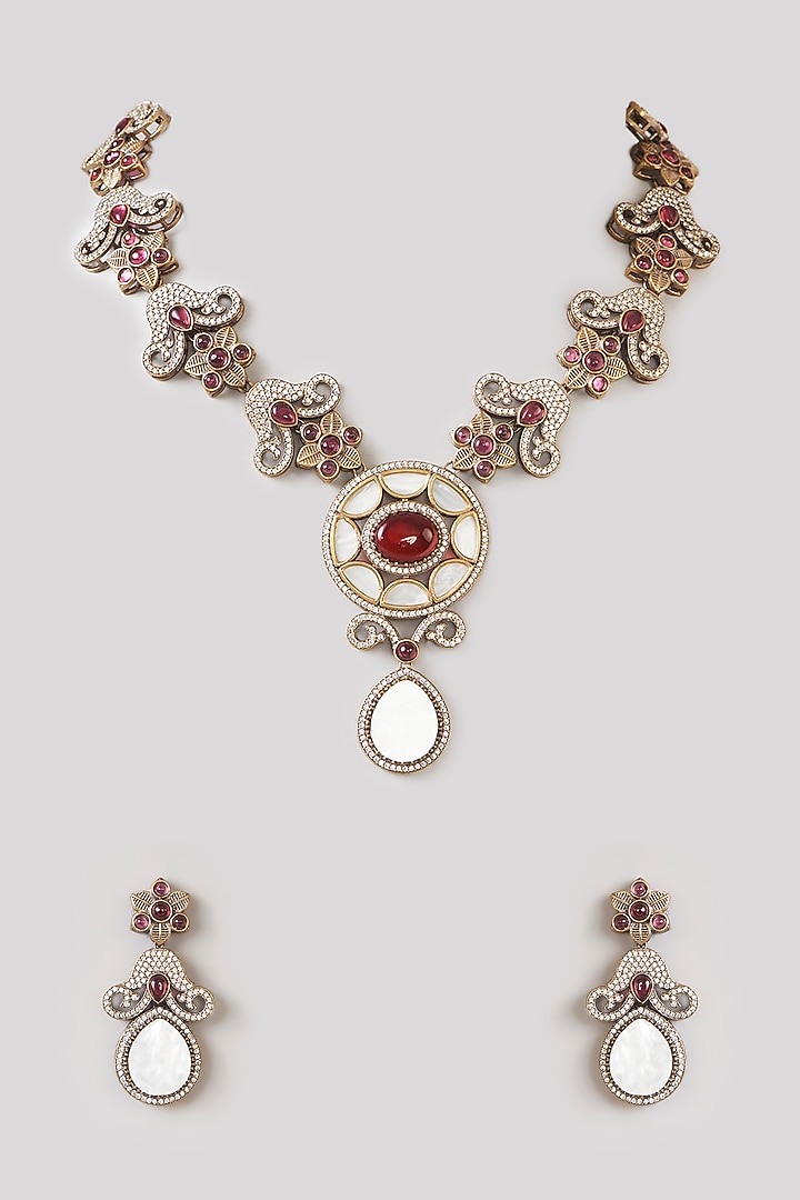 Gold Finish Red Stone & Cubic Zirconia Long Necklace Set by 20AM at Pernia's Pop Up Shop