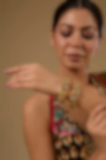 Gold Finish Kundan Polki & Ruby Gemstone Temple Bangles (Set Of 2) by 20AM at Pernia's Pop Up Shop