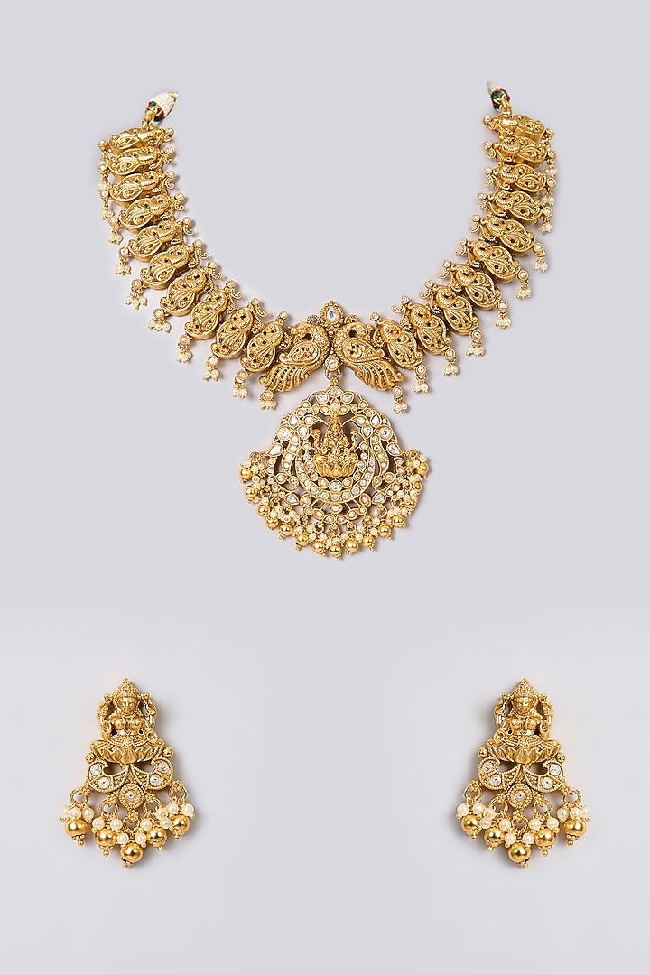 Gold Finish Kundan Polki & Ruby Stone Temple Necklace Set by 20AM at Pernia's Pop Up Shop