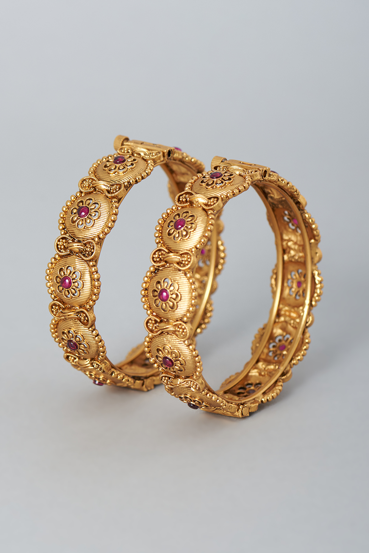 Gold Finish Ruby Stones Bangles by 20AM at Pernia's Pop Up Shop