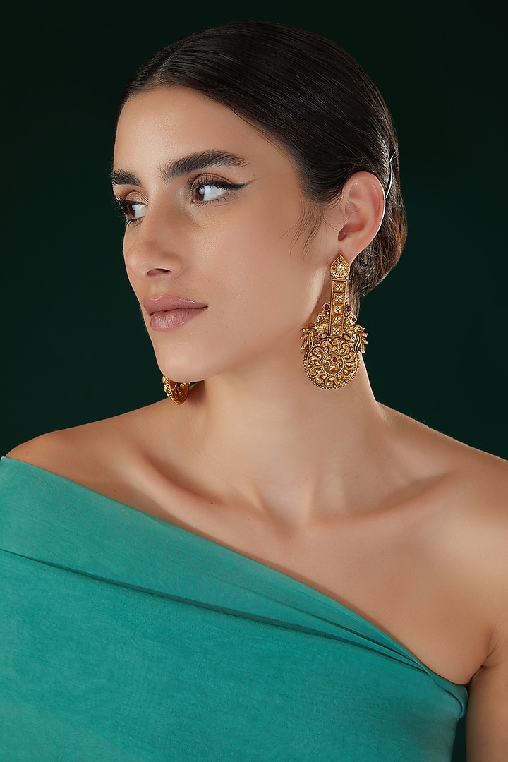 Gold Finish Carved Temple Dangler Earrings by 20AM at Pernia's Pop Up Shop