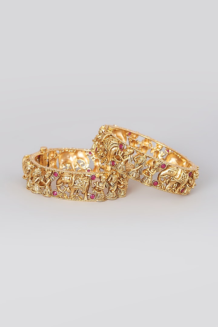 Gold Finish Red Stone Bangles (Set of 2) by 20AM at Pernia's Pop Up Shop