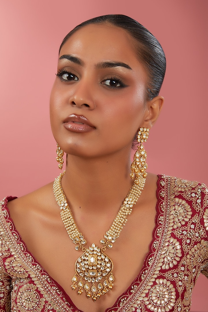 Gold Finish Kundan Polki & White Beaded Long Necklace Set by 20AM at Pernia's Pop Up Shop