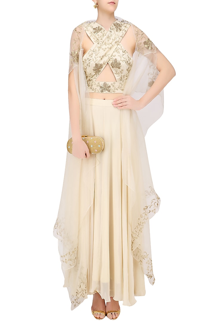 Cream floral embroidered blouse, cape and skirt set available only at Pernia's Pop Up Shop.