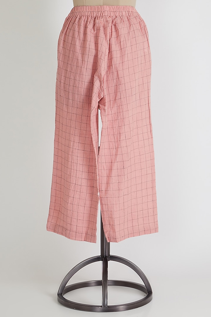 Blush Pink Mid Rise Flared Pants by 3X9T at Pernia's Pop Up Shop
