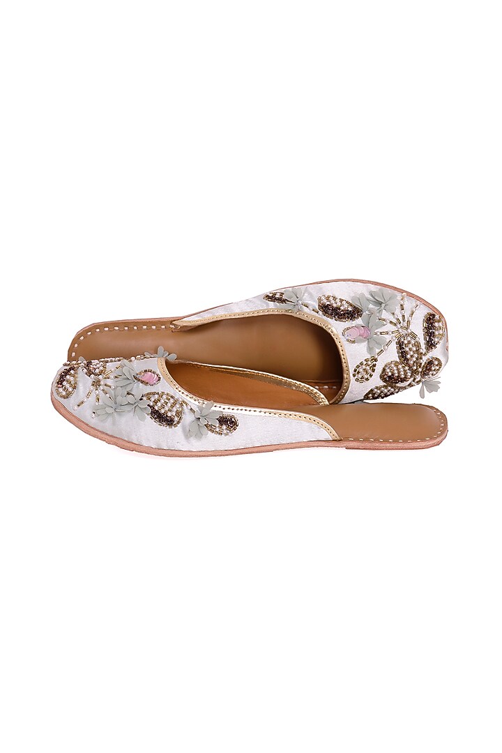 White Juttis With Floral Cutdana Work by 5 Elements at Pernia's Pop Up Shop