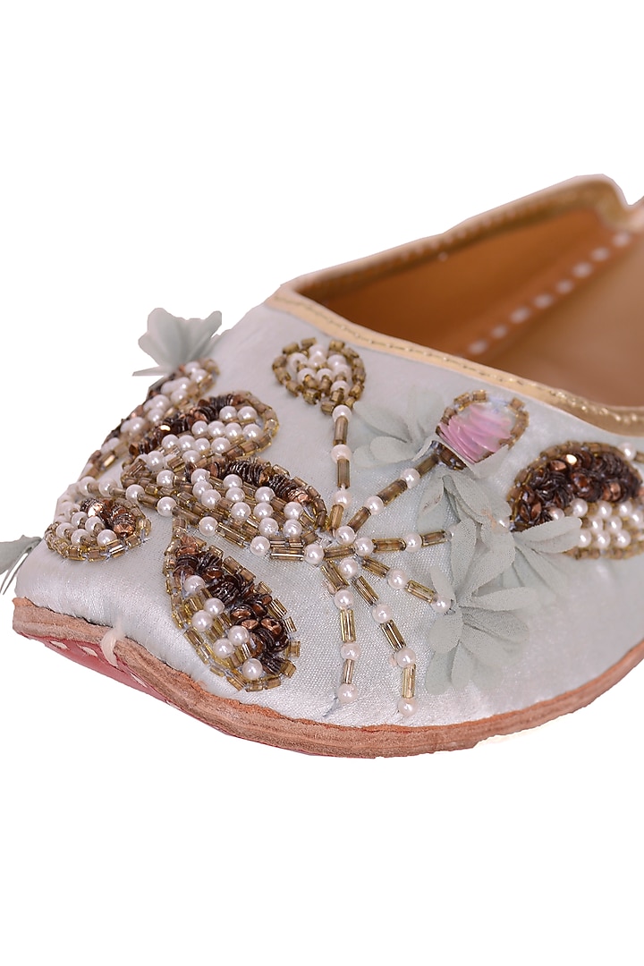 White Juttis With Floral Cutdana Work by 5 Elements at Pernia's Pop Up Shop