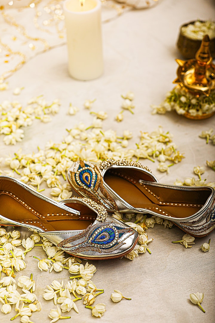 Silver Leatherette Peacock Embroidered Juttis by 5 Elements at Pernia's Pop Up Shop