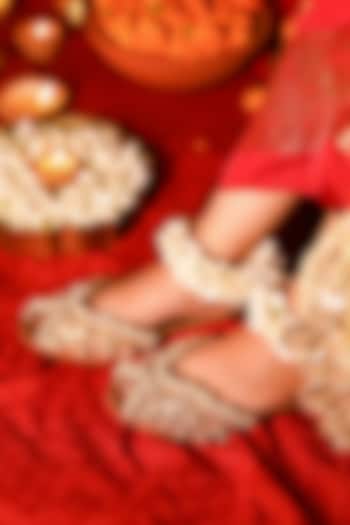 Gold Leatherette Floral Motif Embroidered Juttis by 5 Elements at Pernia's Pop Up Shop