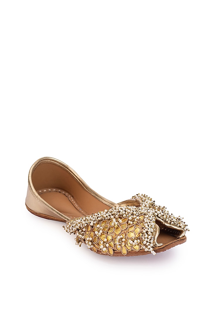Gold Leatherette Floral Motif Embroidered Juttis by 5 Elements at Pernia's Pop Up Shop