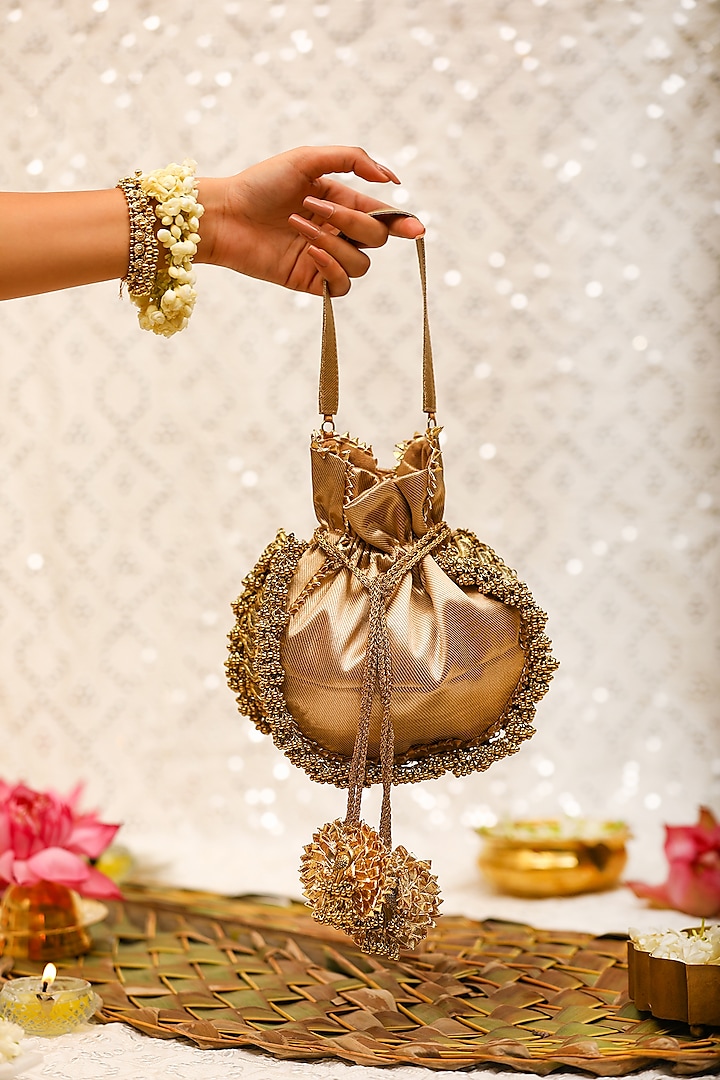 Brown Brocade Ghungroo Embroidered Potli Bag by 5 Elements at Pernia's Pop Up Shop