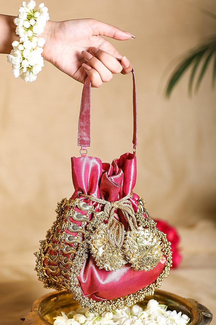 Pink Brocade Ghungroo Embroidered Potli Bag by 5 Elements at Pernia's Pop Up Shop