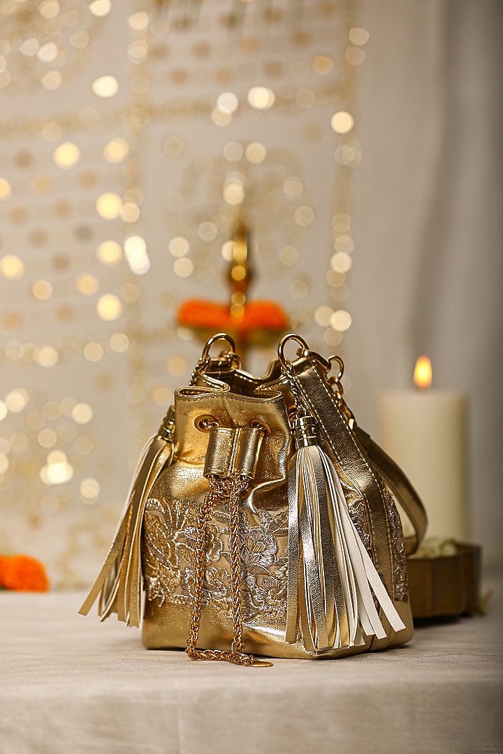 Gold PU Leather Embroidered Handbag by 5 Elements at Pernia's Pop Up Shop