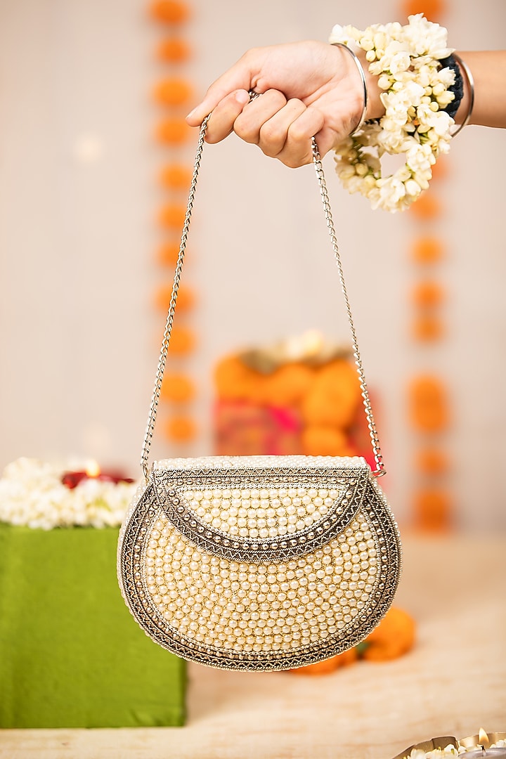 Off-White Metallic Pearl Encrusted Handbag by 5 Elements at Pernia's Pop Up Shop