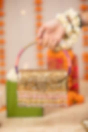 Gold Metallic Floral Embossed Handbag by 5 Elements at Pernia's Pop Up Shop