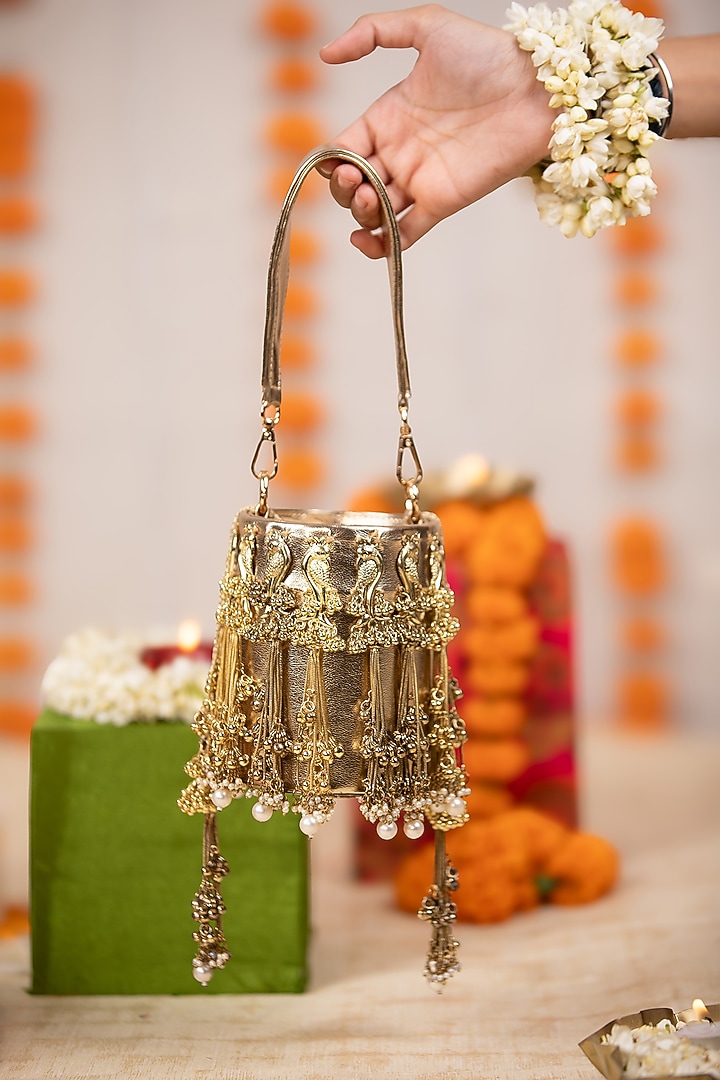 Gold PU Tassel Embellished Potli by 5 Elements at Pernia's Pop Up Shop