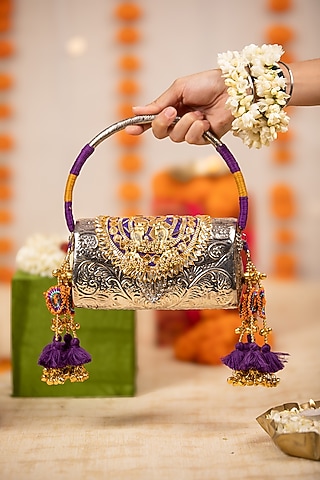 Silver Metallic Floral Embossed Handbag by 5 Elements