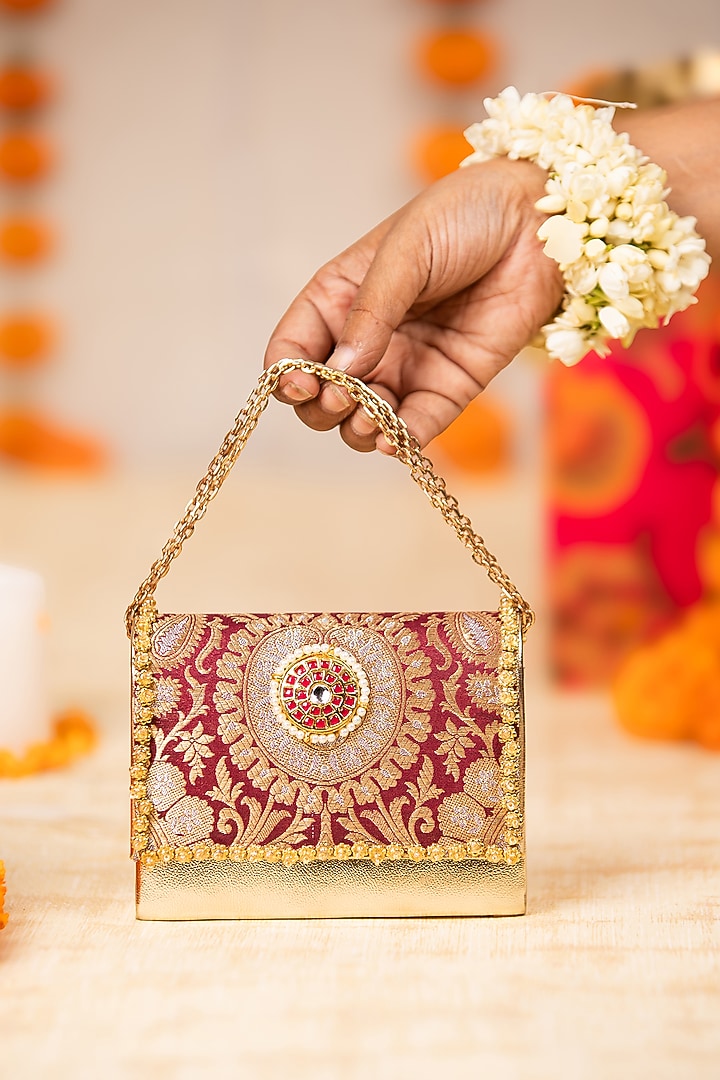 Maroon Brocade & PU Kundan Embellished Handbag by 5 Elements at Pernia's Pop Up Shop
