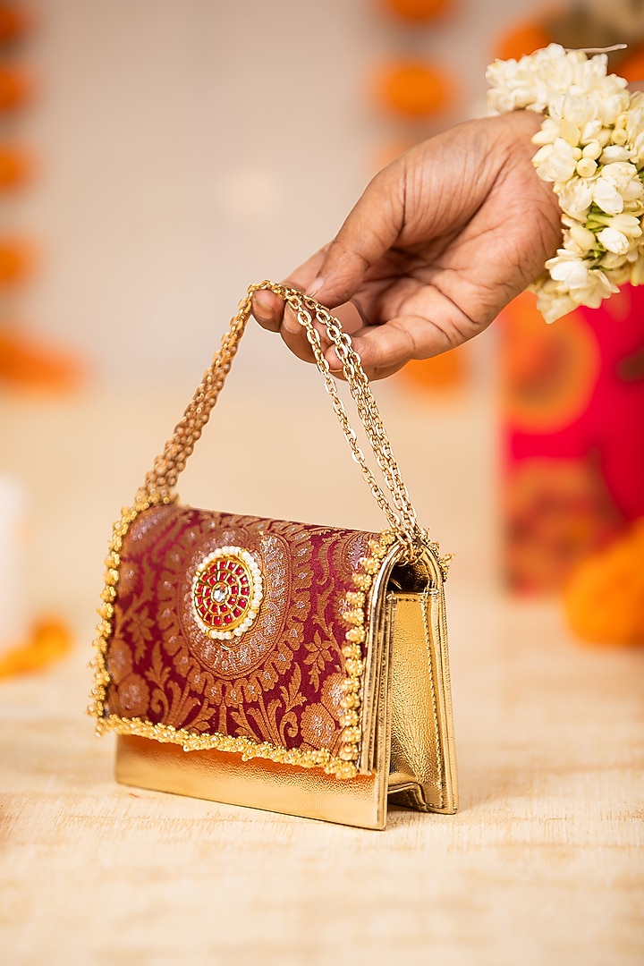 Maroon Brocade & PU Kundan Embellished Handbag by 5 Elements at Pernia's Pop Up Shop