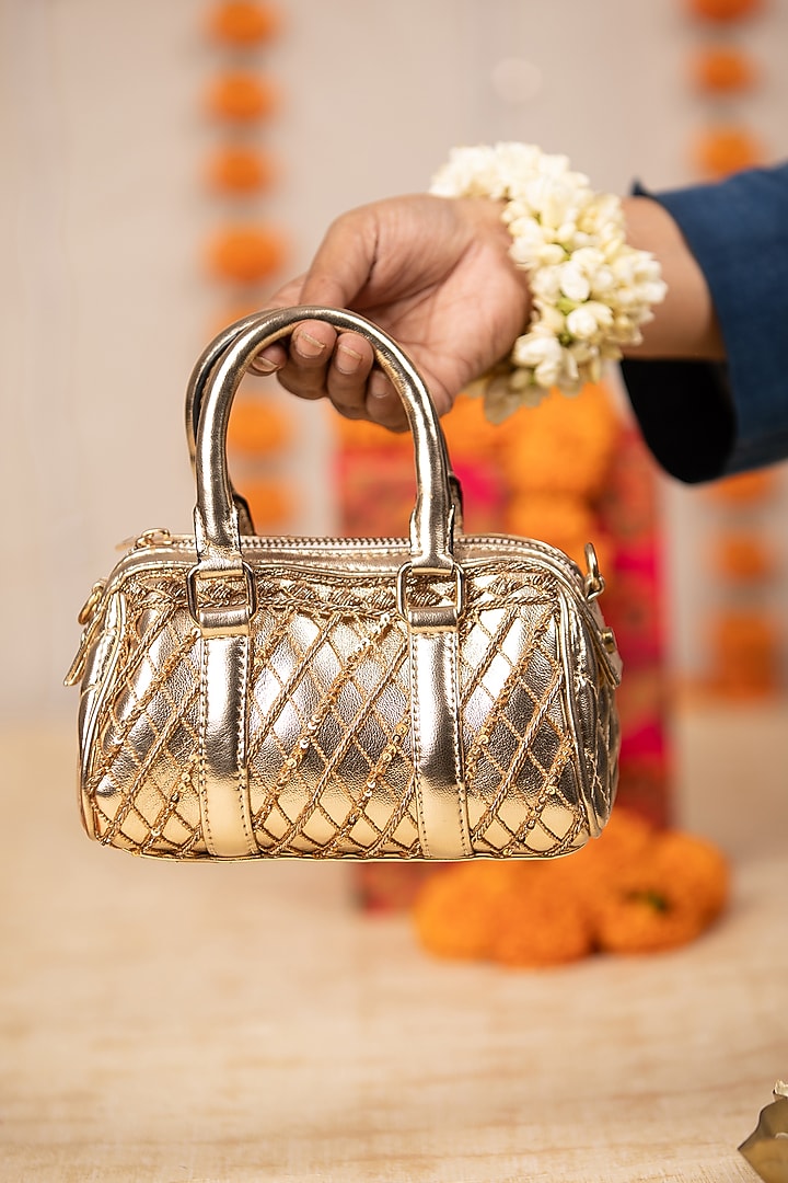 Gold PU Thread Work Handbag by 5 Elements at Pernia's Pop Up Shop
