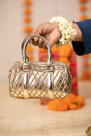 Gold PU Thread Work Handbag by 5 Elements