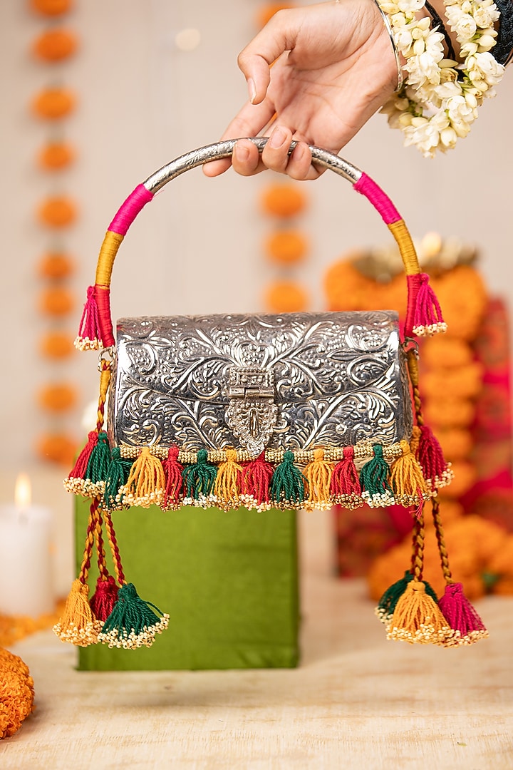 Silver Metallic Floral Motif Embellished Handbag by 5 Elements at Pernia's Pop Up Shop
