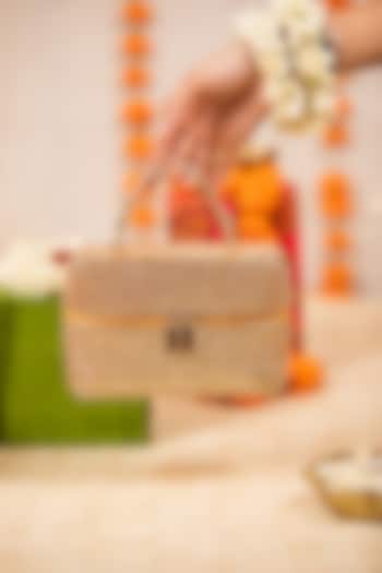 Gold PU Metallic Thread Embroidered Handbag by 5 Elements at Pernia's Pop Up Shop