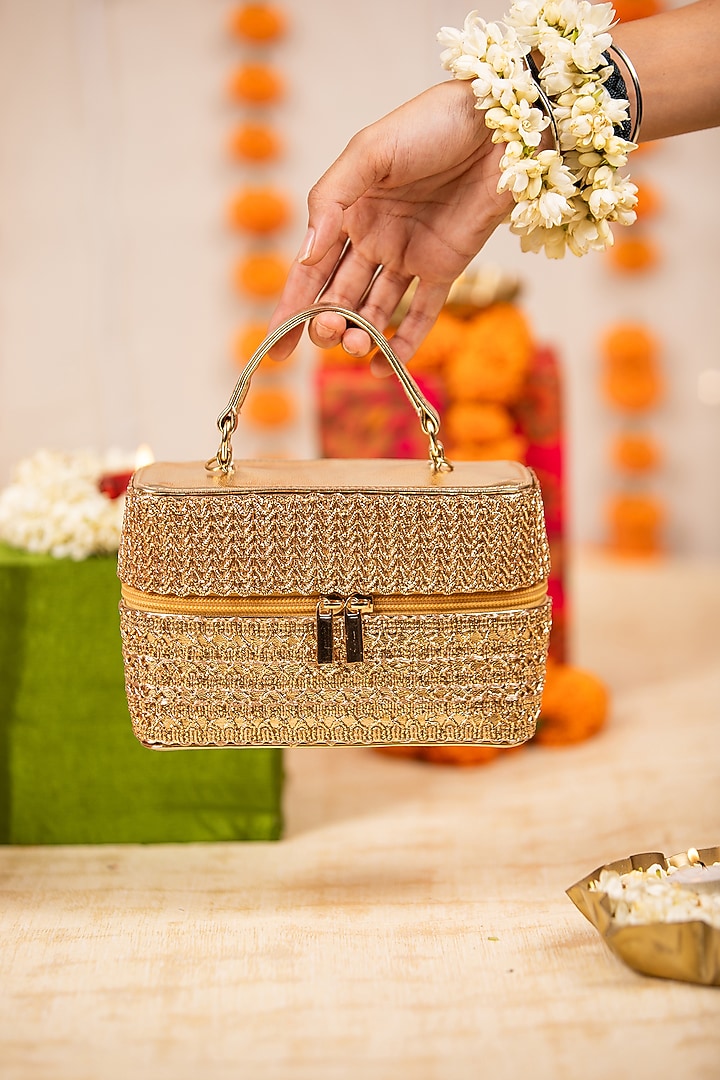 Gold PU Metallic Thread Embroidered Handbag by 5 Elements at Pernia's Pop Up Shop