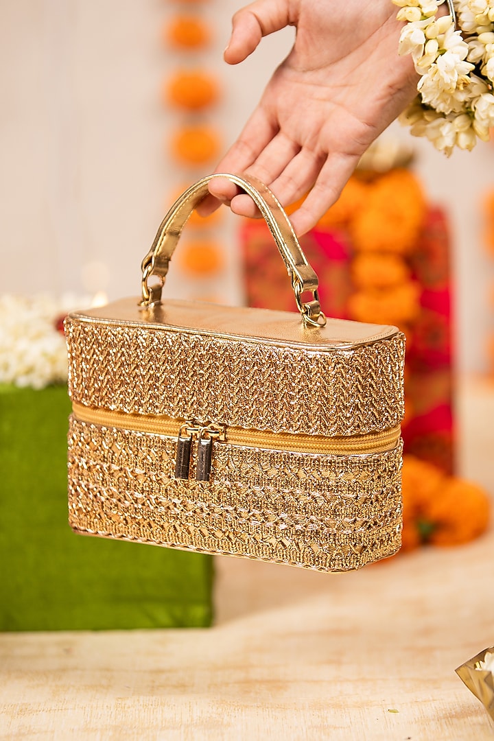 Gold PU Metallic Thread Embroidered Handbag by 5 Elements at Pernia's Pop Up Shop