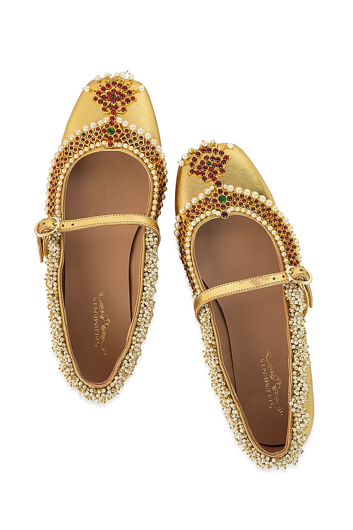 Gold Leatherette Pearl & Crystal Embellished Juttis by 5 Elements at Pernia's Pop Up Shop