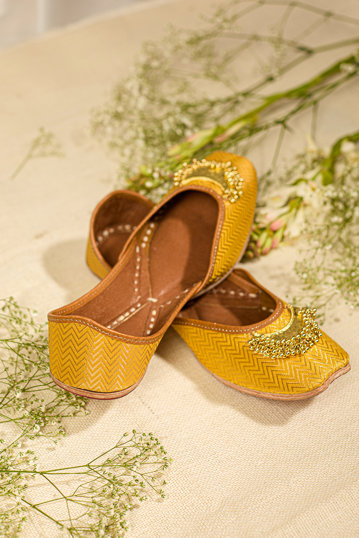 Yellow Leatherette Bead Embroidered Juttis by 5 Elements at Pernia's Pop Up Shop