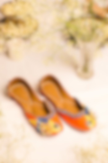 Orange Leatherette Floral Embellished Juttis by 5 Elements at Pernia's Pop Up Shop