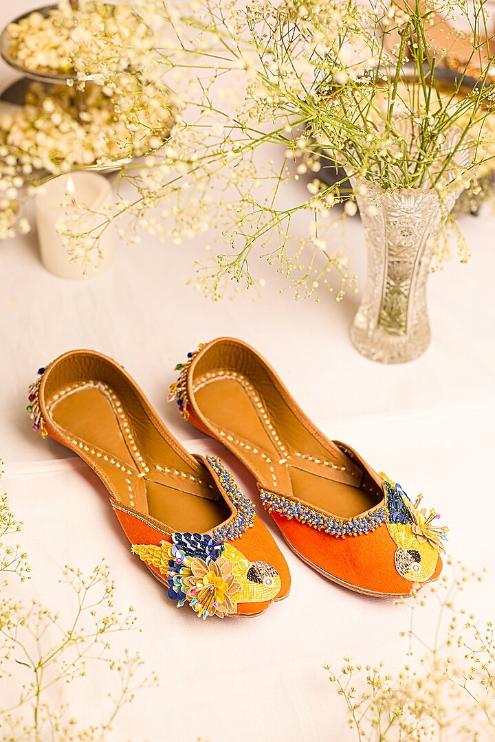 Orange Leatherette Floral Embellished Juttis by 5 Elements at Pernia's Pop Up Shop