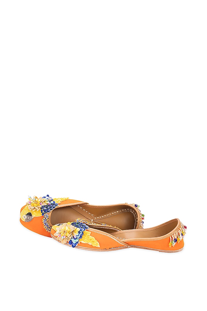Orange Leatherette Floral Embellished Juttis by 5 Elements at Pernia's Pop Up Shop