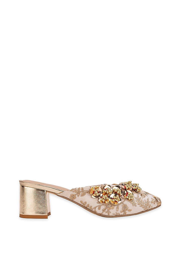 Off-White Leatherette Floral Embellished Mule Heels by 5 Elements at Pernia's Pop Up Shop