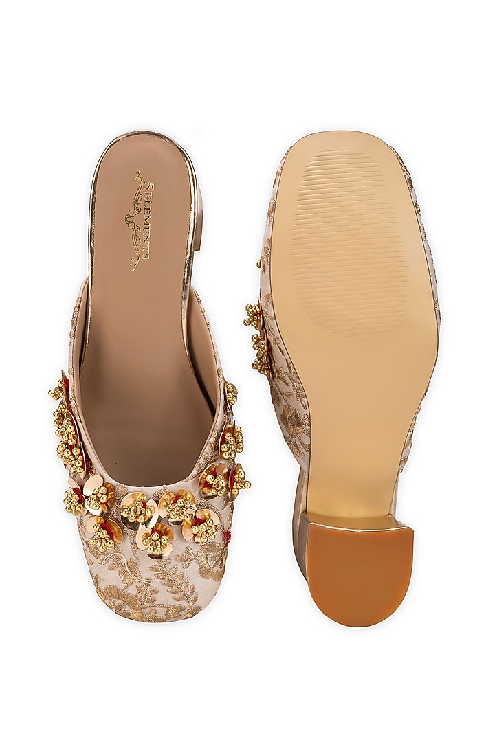 Off-White Leatherette Floral Embellished Mule Heels by 5 Elements at Pernia's Pop Up Shop