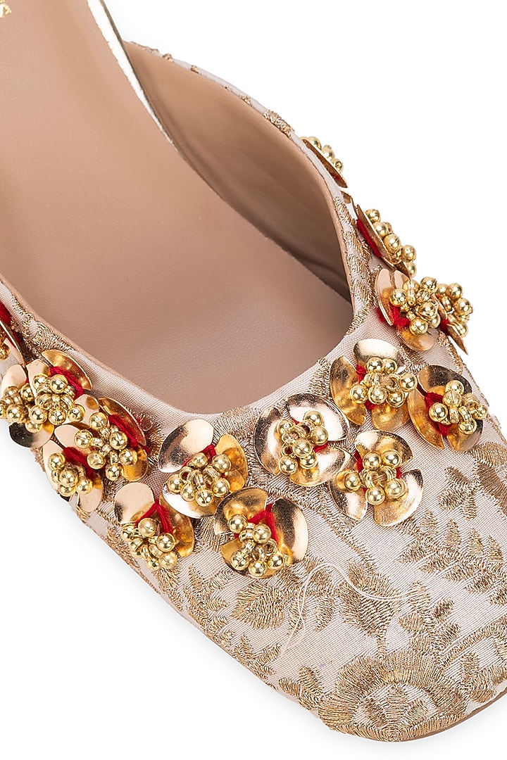 Off-White Leatherette Floral Embellished Mule Heels by 5 Elements at Pernia's Pop Up Shop