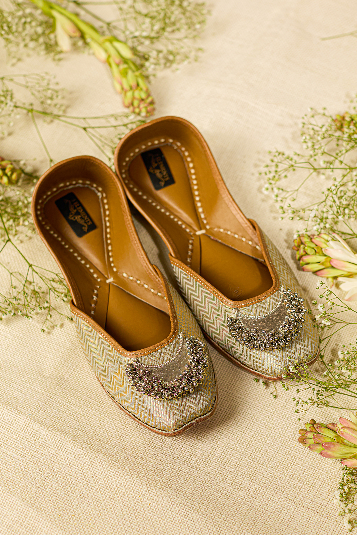 Beige Leatherette Embellished Juttis by 5 Elements at Pernia's Pop Up Shop