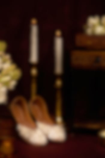 Off-White Leatherette Pearl Embroidered Juttis by 5 Elements at Pernia's Pop Up Shop