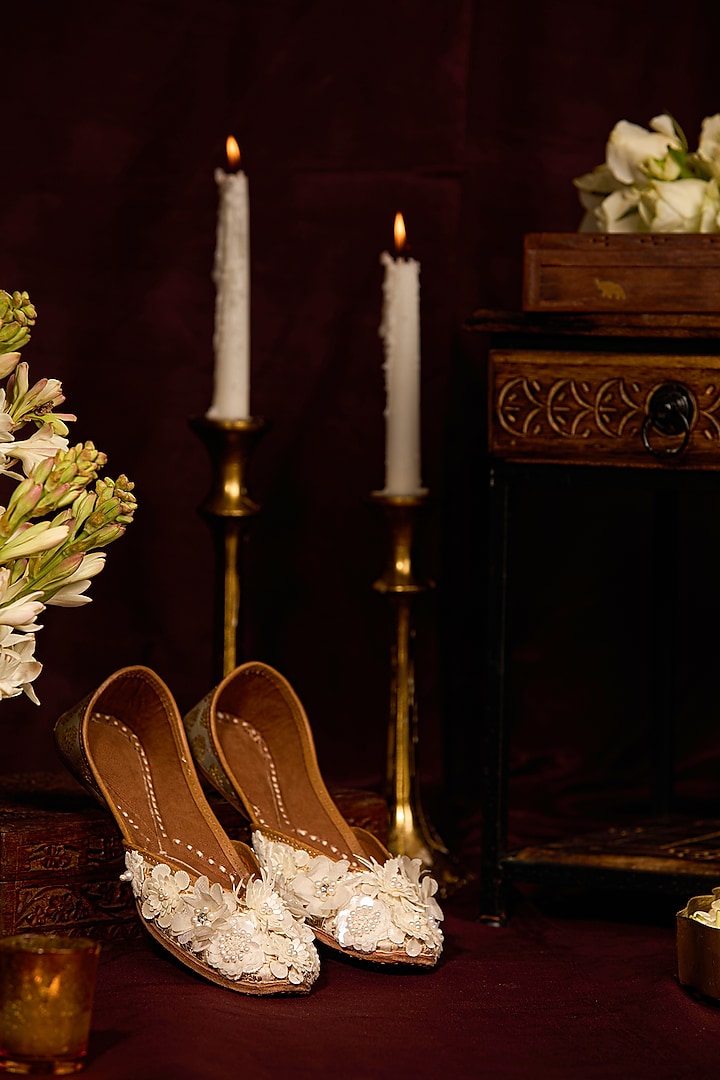 Off-White Leatherette Pearl Embroidered Juttis by 5 Elements at Pernia's Pop Up Shop