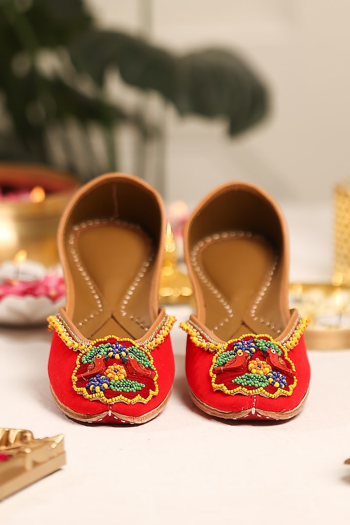Red Leatherette Hand Embroidered Juttis by 5 Elements at Pernia's Pop Up Shop